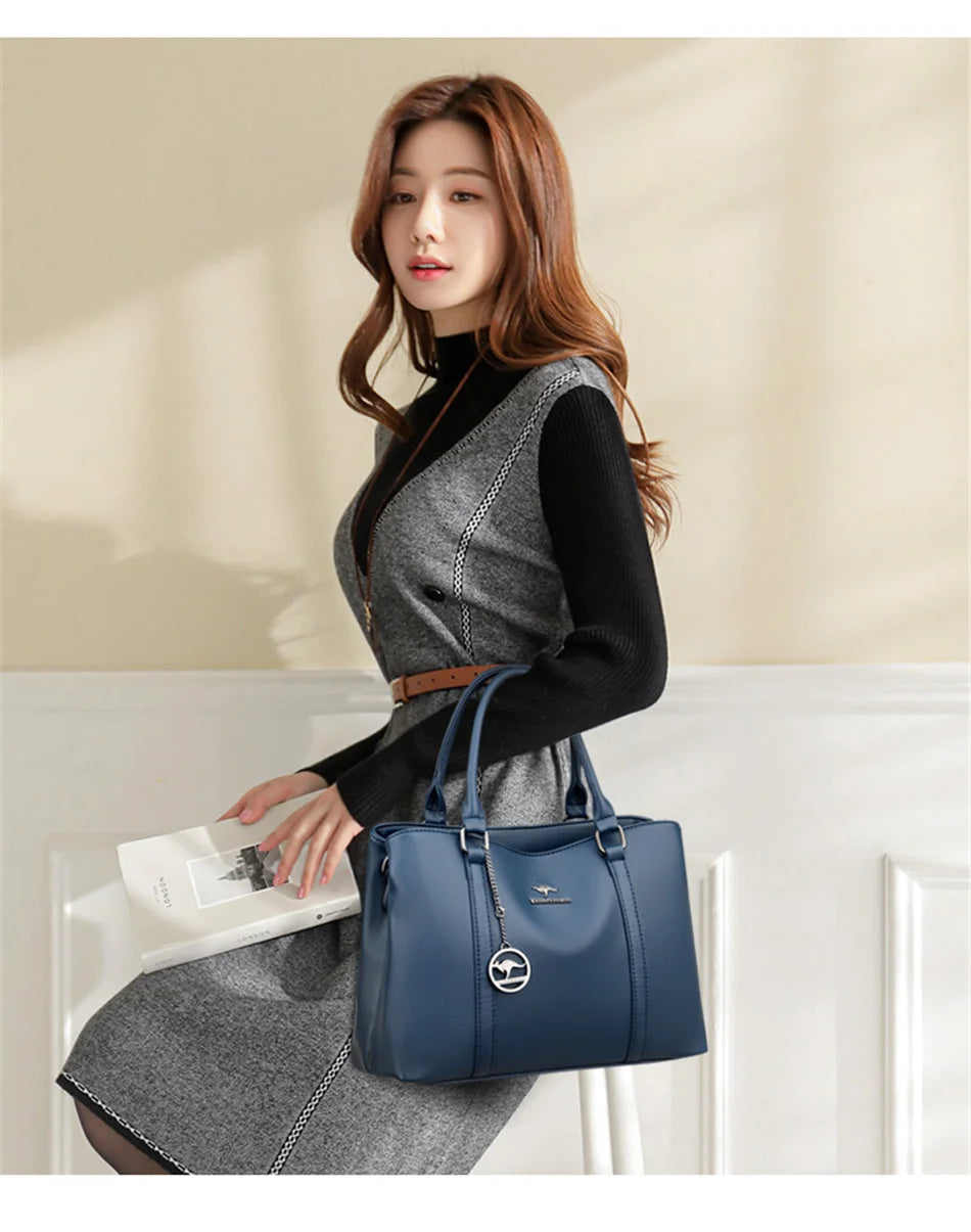 Masterpiece Grained Leather Messenger Bag