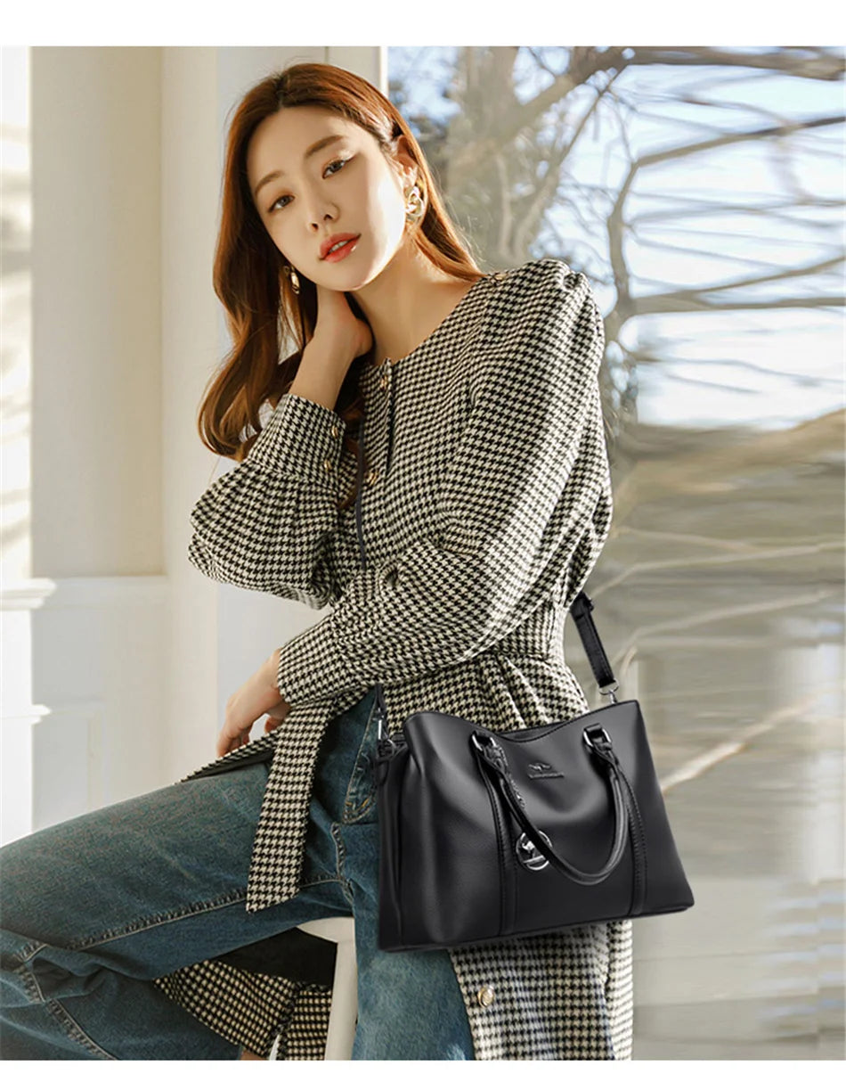 Masterpiece Grained Leather Messenger Bag