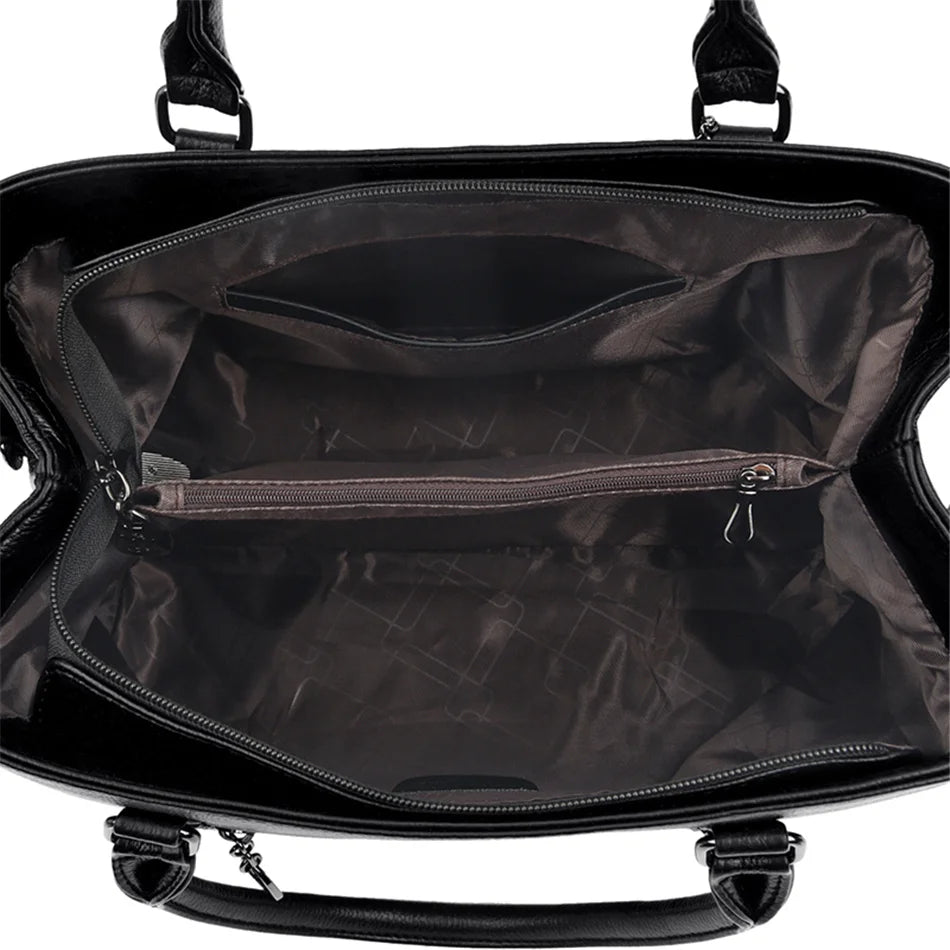 Masterpiece Grained Leather Messenger Bag