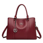 Masterpiece Grained Leather Messenger Bag